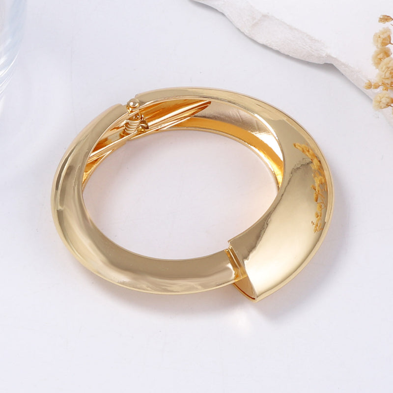 Bracelet ressort annulaire irrégulier femme